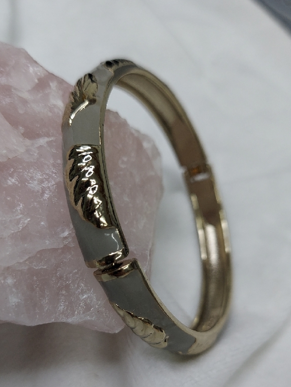 Gold Tone Bangle Bracelet with Gray Enamel and Leaf Accents